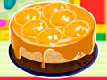 Orange Ribbon Cheesecake - Prepare um delicioso cheesecake para a festa. Siga as instruções antes de começar a fazer o bolo e respeite cuidadosamente o tempo do cozimento.